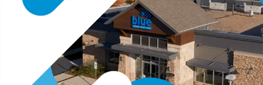 Financial explainer video thumbnail featuring Blue Federal Credit Union headquarters.